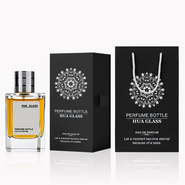 HUA0235 perfume bottle, square transparent glass body with thick base, 30 ml, 50 ml, or 100 ml liquid, cylindrical plastic cap with side threading and metallic finish in gold, black, or silver, brand label applied on bottle, modern luxurious design, ideal for gifting and daily use.