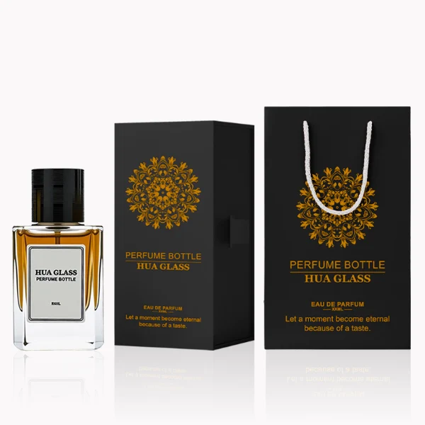 HUA0235 perfume bottle, square transparent glass body with thick base, 30 ml, 50 ml, or 100 ml liquid, cylindrical plastic cap with side threading and metallic finish in gold, black, or silver, brand label applied on bottle, modern luxurious design, ideal for gifting and daily use.