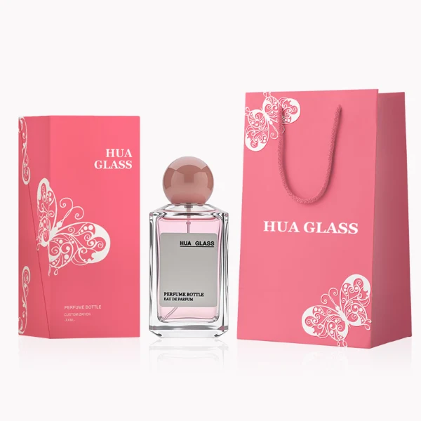 HUA0237 perfume bottle, square transparent glass body with thick base, 50 ml, 70 ml, or 100 ml liquid, spherical plastic cap, customizable, brand label applied on bottle, modern luxurious design, ideal for gifting and daily use.