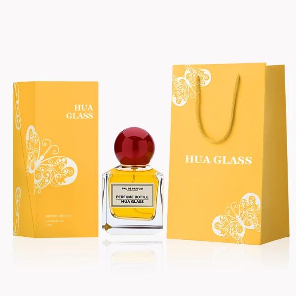 HUA0237 perfume bottle, square transparent glass body with thick base, 50 ml, 70 ml, or 100 ml liquid, spherical plastic cap, customizable, brand label applied on bottle, modern luxurious design, ideal for gifting and daily use.