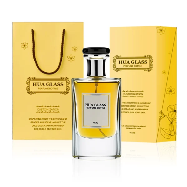 HUA0239 perfume bottle, square transparent glass body with thick base, 80 ml liquid, flat cylindrical plastic cap with customizable color, gold or silver neck, brand label applied on bottle, modern luxurious design, ideal for gifting and daily use.