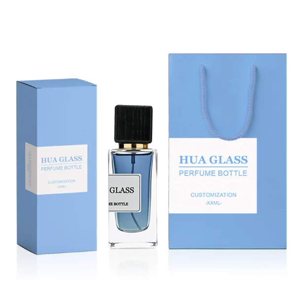 HUA0240 perfume bottle, square transparent glass body with thick base, 30 ml, 50 ml, or 100 ml liquid, square wooden cap with gold neck, brand label applied on bottle, modern luxurious design, ideal for gifting and daily use.