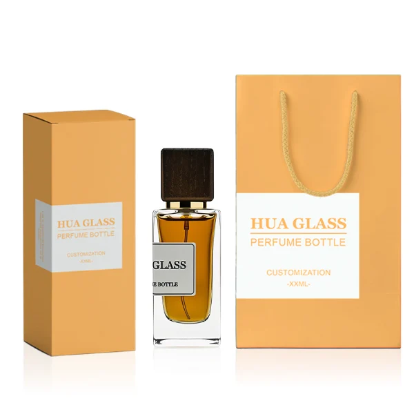 HUA0240 perfume bottle, square transparent glass body with thick base, 30 ml, 50 ml, or 100 ml liquid, square wooden cap with gold neck, brand label applied on bottle, modern luxurious design, ideal for gifting and daily use.