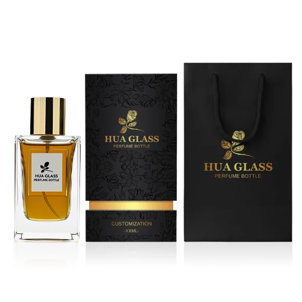 HUA0241 perfume bottle, square transparent glass body with thick base, 50 ml or 100 ml liquid, cylindrical plastic cap, brand label applied on bottle, modern luxurious design, ideal for gifting and daily use.