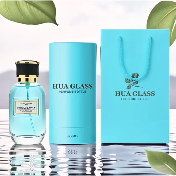 HUA0244 perfume bottle, cylindrical transparent glass body with thick base, 100 ml liquid, cylindrical plastic cap with exterior wrapped in leather or textured pattern, gold-colored bottle neck, brand label applied on bottle, modern luxurious design, ideal for gifting and daily use.