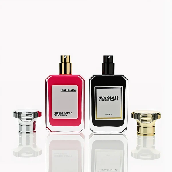 HUA0245 perfume bottle, rectangular transparent glass body with beveled corners and thick base, customizable inner spray colors, 30 ml, 50 ml, or 100 ml liquid, irregular metallic plastic cap with silver or gold side bar details, printed logo label, modern luxury fashion design, ideal for gifting and daily use.