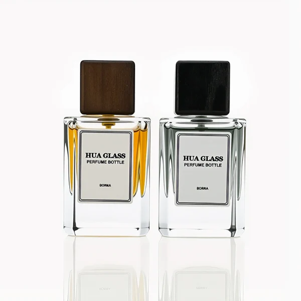 HUA0246 perfume bottle, rectangular transparent glass body with thick base, 30 ml, 50 ml, or 100 ml liquid, rectangular wooden cap, brand label applied on bottle, modern luxurious design, ideal for gifting and daily use.