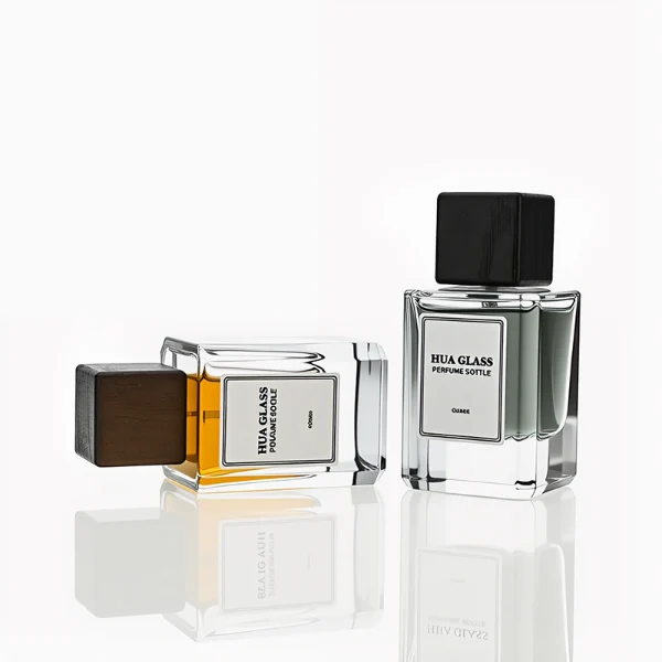HUA0246 perfume bottle, rectangular transparent glass body with thick base, 30 ml, 50 ml, or 100 ml liquid, rectangular wooden cap, brand label applied on bottle, modern luxurious design, ideal for gifting and daily use.