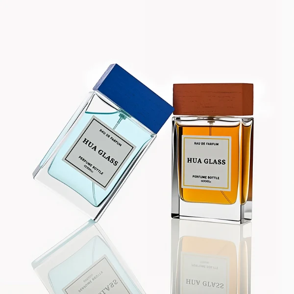 HUA0247 perfume bottle, rectangular transparent glass body with thick base, 100 ml liquid, rectangular wooden cap with customizable color, brand label applied on bottle, modern luxurious design, ideal for gifting and daily use.