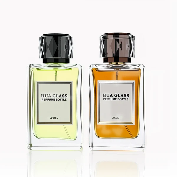 HUA0250 perfume bottle, rectangular transparent glass body with thick base, 100 ml liquid, black cylindrical plastic inner cap with transparent outer plastic, brand label applied on bottle, modern luxurious design, ideal for gifting and daily use.