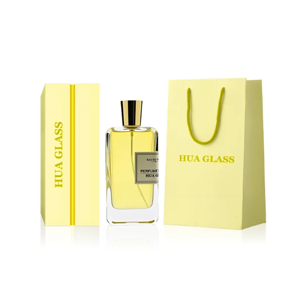 HUA0251 perfume bottle, rectangular transparent glass body with thick base, 100 ml liquid, cylindrical plastic cap with smooth high-gloss surface, flat top, straight uniform sides, tightly fitted to bottle neck, brand label applied on bottle, modern luxurious design, ideal for gifting and daily use.