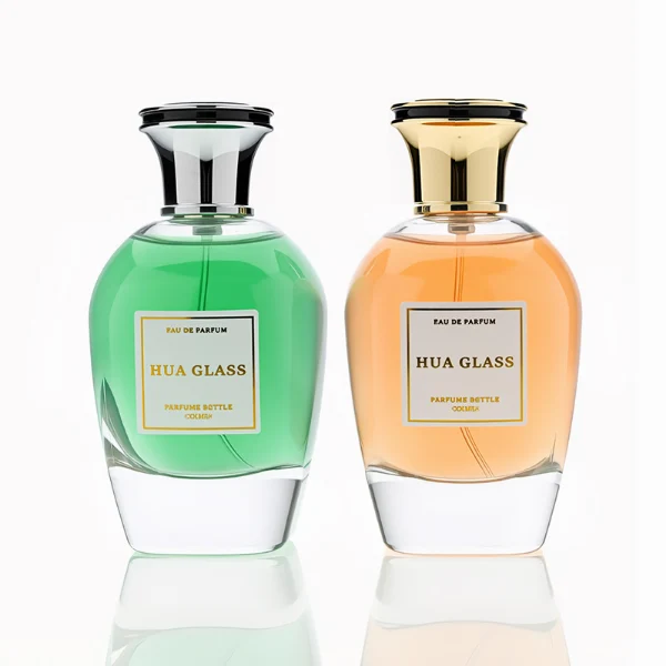 HUA0255 perfume bottle, rounded transparent glass body with soft curved silhouette and thick base, 100 ml liquid, flared Zamac cap with flat top and glossy finish, printed logo label, elegant luxury design, ideal for gifting and daily use.