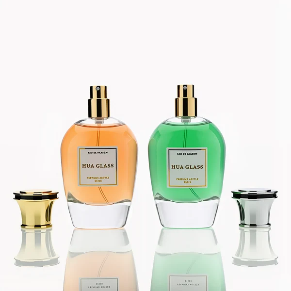 HUA0255 perfume bottle, rounded transparent glass body with soft curved silhouette and thick base, 100 ml liquid, flared Zamac cap with flat top and glossy finish, printed logo label, elegant luxury design, ideal for gifting and daily use.