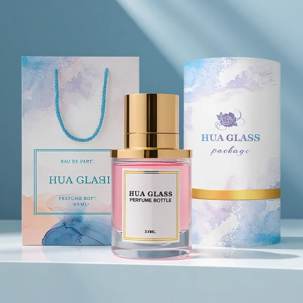 HUA0264 perfume bottle, cylindrical transparent glass body with thick rounded base, 50 ml or 100 ml liquid, stamp-shaped aluminum and magnet cap with glossy black or gold finish, printed logo label, modern luxury minimalist design, ideal for gifting and daily use.
