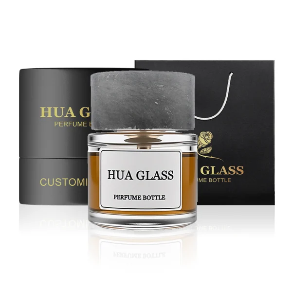 HUA0276 perfume bottle features a transparent colorless glass body with thick rounded base, smooth oval silhouette, and curved shoulder design, containing 80 ml of liquid. Finish: FEA15-crimp. Bottle Material: Glass. Bottle Color: Transparent, colorless. Bottle Shape: Oval body with rounded contours and thick base. Cap Style: Glossy spherical resin cap with marble-like texture in customizable colors. Cap Material: Resin. Surface Handling: Printed label attached on the bottle surface. Design Style: Modern elegant luxury. Ideal for personal fragrance use, gifting, and display.
