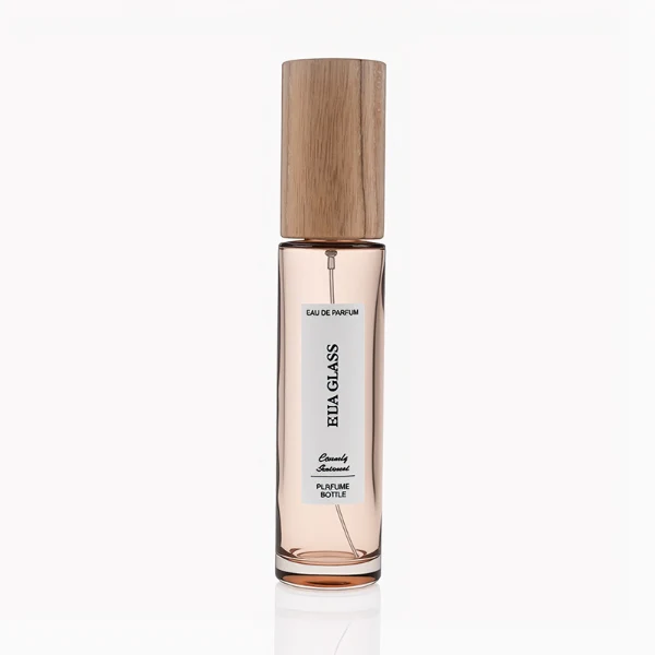 HUA0269 perfume bottle, slim cylindrical transparent glass body with rounded base, 30 ml, 50 ml, or 100 ml liquid, tall cylindrical wooden cap with natural wood grain texture, printed vertical logo label, natural minimalist elegance design, ideal for gifting and travel use.