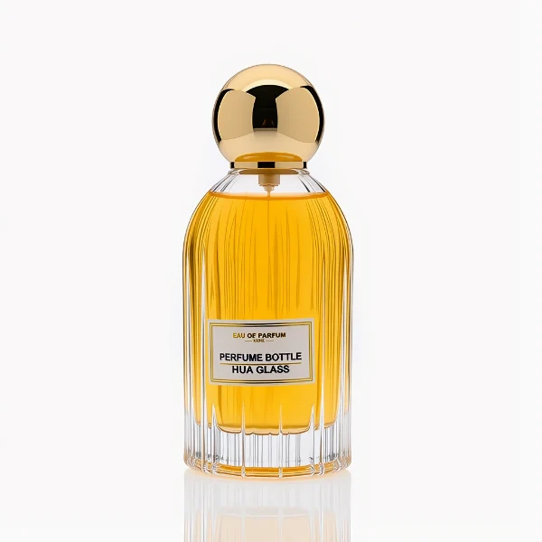 HUA0271 perfume bottle, cylindrical transparent glass body with vertical fluted texture and thick rounded base, 100 ml liquid, oversized spherical magnetic cap with glossy black or gold mirror finish, printed logo label, vintage luxury elegance design, ideal for gifting and daily use.