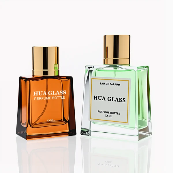 HUA0272 perfume bottle, semi-transparent blue or amber rectangular glass body with beveled edges and thick base, 35 ml, 50 ml, or 100 ml liquid, glossy cylindrical aluminum magnetic cap in gold or black, custom printed logo on bottle surface, modern luxury fashion design, ideal for gifting and daily use.