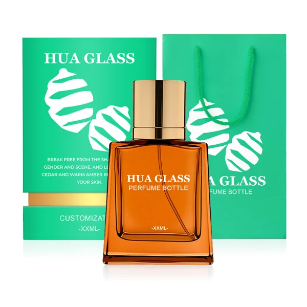 HUA0272 perfume bottle, semi-transparent blue or amber rectangular glass body with beveled edges and thick base, 35 ml, 50 ml, or 100 ml liquid, glossy cylindrical aluminum magnetic cap in gold or black, custom printed logo on bottle surface, modern luxury fashion design, ideal for gifting and daily use.
