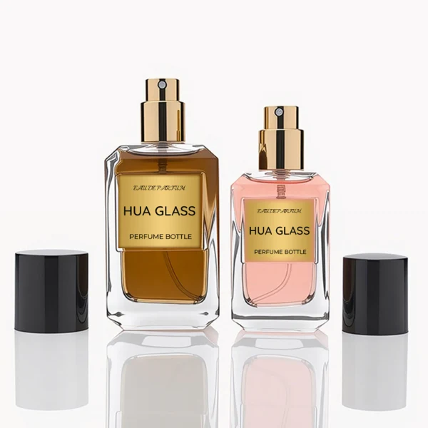 HUA0275 perfume bottle, transparent colorless octagonal glass body with beveled edges and thick base, 30 ml or 50 ml liquid, glossy black cylindrical plastic cap with flat top, aluminum label/sticker attached on bottle surface, modern minimalist luxury design, ideal for gifting and daily use.