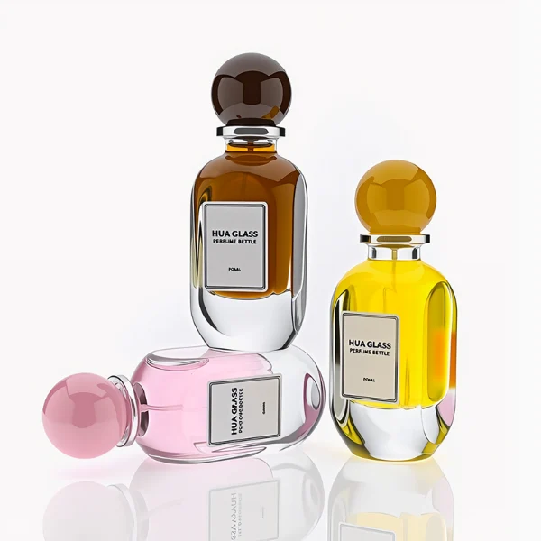 HUA0276 perfume bottle, transparent colorless oval glass body with rounded contours and thick base, 80 ml liquid, glossy spherical resin cap with marble-like texture in customizable colors, printed label attached on bottle surface, modern elegant luxury design, ideal for gifting and daily use.