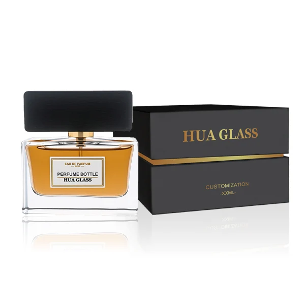 HUA0277 perfume bottle, transparent colorless rectangular glass body with thick base and straight edges, 30 ml, 50 ml, or 100 ml liquid, wide flat rectangular wooden cap in black or natural wood finish with gold bottle neck, printed label attached on bottle surface, modern minimalist luxury design, ideal for gifting and daily use.