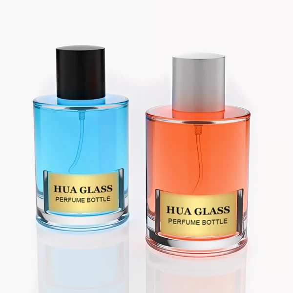 HUA0280 perfume bottle, cylindrical transparent glass body with thick base, 100 ml liquid, glossy flat cylindrical plastic cap in black or white, aluminum label/sticker attached on bottle surface, modern minimalist fashion design, ideal for gifting and daily use.