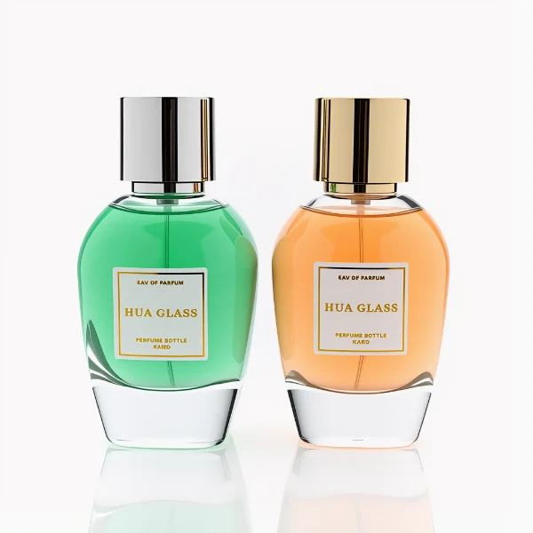 HUA0282 perfume bottle, rounded transparent glass body with thick clear base and customizable transparent colors, 100 ml liquid, glossy cylindrical Zamac cap in silver or gold finish with matching bottle neck, gold-bordered label attached on bottle surface, modern elegant luxury design, ideal for gifting and daily use.