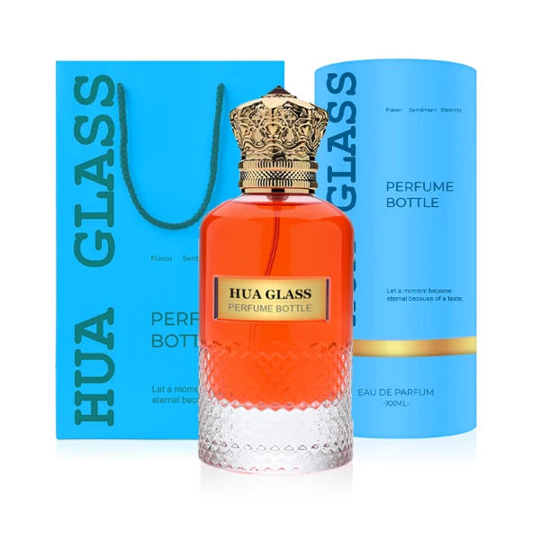 HUA0283 perfume bottle, cylindrical transparent colorless glass body with embossed textured lower section, 100 ml liquid, ornate crown-shaped glossy gold Zamac cap, gold label attached on bottle surface, vintage luxurious fashion design, ideal for gifting and daily use.