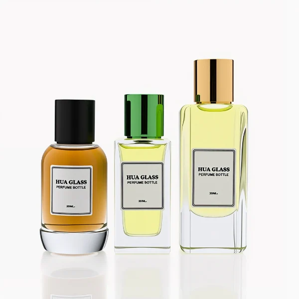 HUA0287 perfume bottle, transparent colorless glass body in cylindrical, rectangular, and ribbed shapes with thick base, 30 ml, 50 ml, or 100 ml liquid, glossy cylindrical aluminum magnetic cap in black, silver, or gold finish, printed label attached on bottle surface, modern minimalist luxury design, ideal for gifting and daily use.