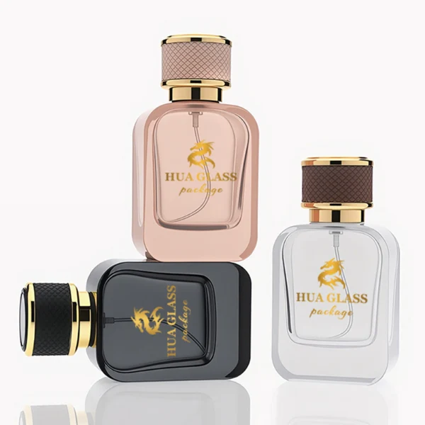 HUA0288 perfume bottle, rounded rectangular transparent or customizable semi-transparent glass body with thick base, 30 ml, 50 ml, or 100 ml liquid, cylindrical gold plastic cap wrapped with mesh-textured leather and gold bottle neck, gold printed logo on bottle surface, modern luxurious fashion design, ideal for gifting and daily use.