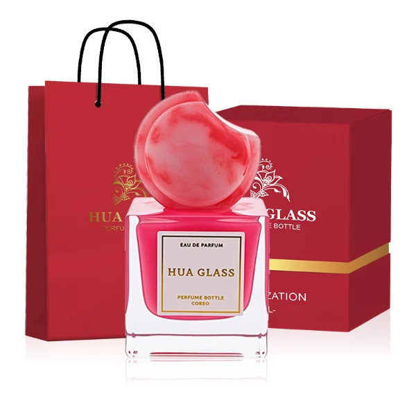 HUA0293 perfume bottle, square internally sprayed glass body with thick base and customizable colors, 30 ml, 50 ml, or 100 ml liquid, flattened crescent-shaped resin cap in customizable colors, printed label attached on bottle surface, modern playful luxury design, ideal for gifting and daily use.