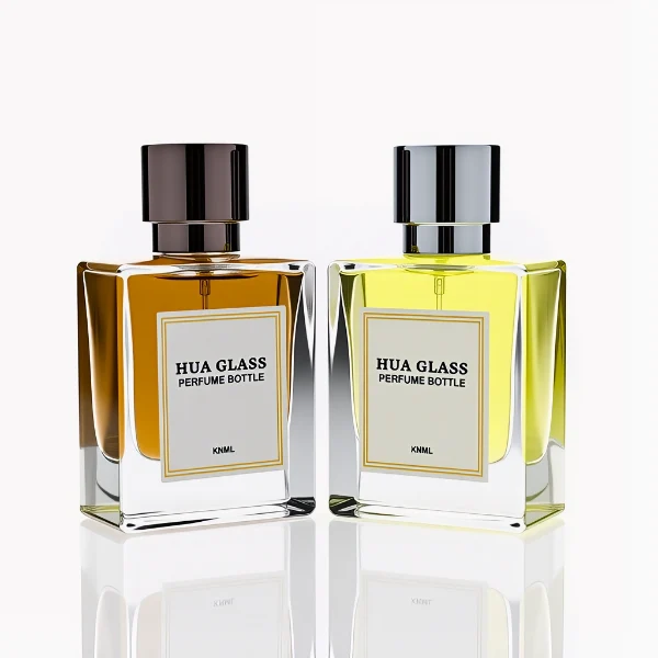 HUA0294 perfume bottle, square transparent colorless glass body with thick base and beveled edges, 50 ml liquid, glossy cylindrical Zamac cap in black, gold, or silver finish with matching bottle neck, printed label attached on bottle surface, modern minimalist luxury design, ideal for gifting and daily use.