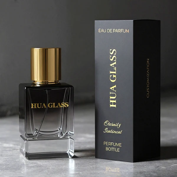 HUA0298 perfume bottle, gradient semi-transparent glass body with thick base and curved side contours, 30 ml, 50 ml, or 100 ml liquid, glossy cylindrical aluminum cap in black, silver, or gold finish, printed logo on bottle surface, modern minimalist luxury design, ideal for gifting and daily use.