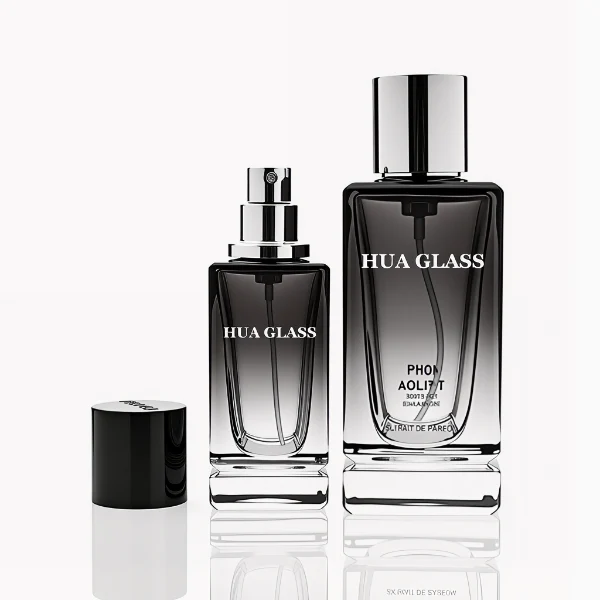 HUA0298 perfume bottle, gradient semi-transparent glass body with thick base and curved side contours, 30 ml, 50 ml, or 100 ml liquid, glossy cylindrical aluminum cap in black, silver, or gold finish, printed logo on bottle surface, modern minimalist luxury design, ideal for gifting and daily use.