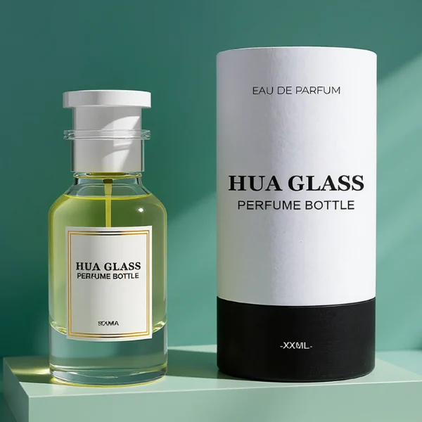 HUA0305 perfume bottle, cylindrical transparent colorless glass body with thick rounded base and curved shoulders, 50 ml or 100 ml liquid, stopper-shaped cylindrical plastic cap in black or white finish, printed label attached on bottle surface, modern minimalist luxury design, ideal for gifting and daily use.