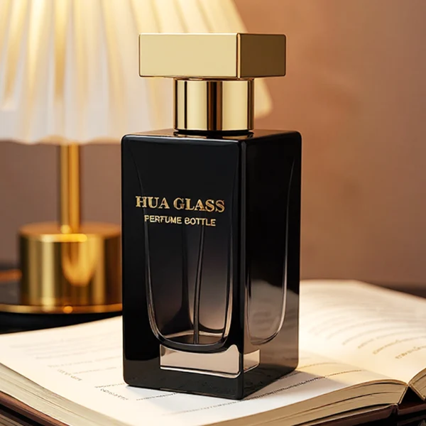 HUA0306 perfume bottle, rectangular transparent colorless or semi-transparent gradient black glass body with thick base and sharp edges, 30 ml, 50 ml, or 100 ml liquid, glossy T-shaped Zamac cap in silver, gold, or black finish, printed label or logo on bottle surface, modern luxury minimalist design, ideal for gifting and daily use.