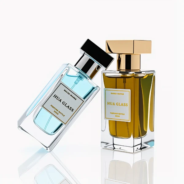 HUA0306 perfume bottle, rectangular transparent colorless or semi-transparent gradient black glass body with thick base and sharp edges, 30 ml, 50 ml, or 100 ml liquid, glossy T-shaped Zamac cap in silver, gold, or black finish, printed label or logo on bottle surface, modern luxury minimalist design, ideal for gifting and daily use.