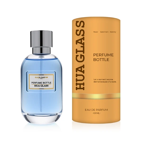 HUA0310 perfume bottle, rounded transparent colorless glass body with thick base and smooth curved silhouette, 100 ml liquid, glossy cylindrical Zamac cap with matching gold or silver metallic gloss bottle neck, printed label attached on bottle surface, modern minimalist luxury design, ideal for gifting and daily use.