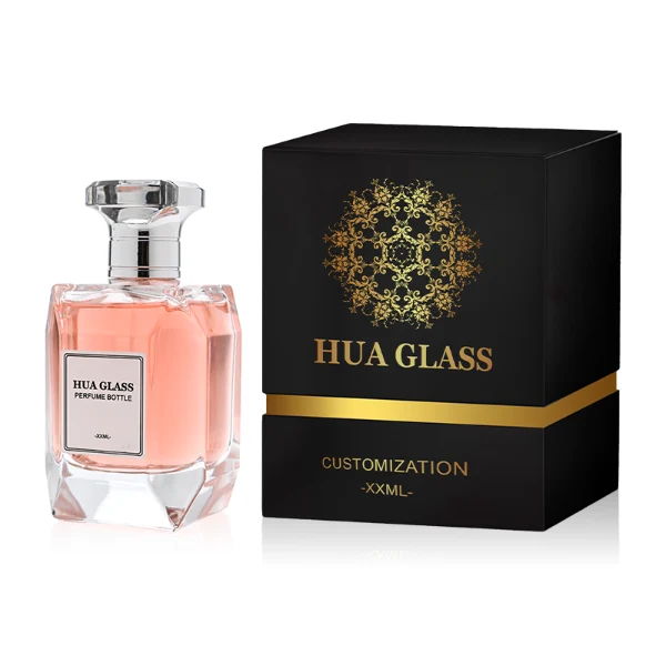 HUA0312 perfume bottle, transparent colorless multifaceted angular-cut glass body with thick geometric base, 100 ml liquid, multifaceted spherical or layered bowl-shaped plastic cap with gold bottle neck, printed label attached on bottle surface, elegant modern luxury design, ideal for gifting and daily use.