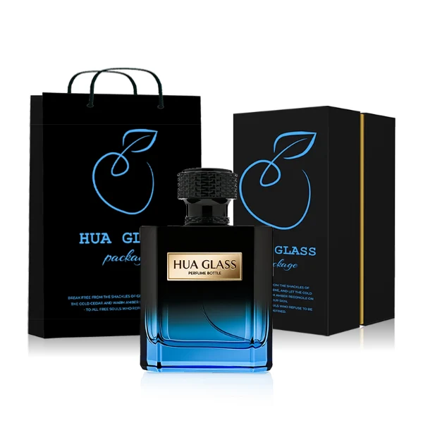 HUA0315 perfume bottle, rectangular semi-transparent glass body with blue-to-black gradient color, thick base and sharp edges, 50 ml or 100 ml liquid, textured cylindrical black plastic cap with layered neck detail, aluminum label/sticker attached on bottle surface, modern masculine luxury design, ideal for gifting and daily use.