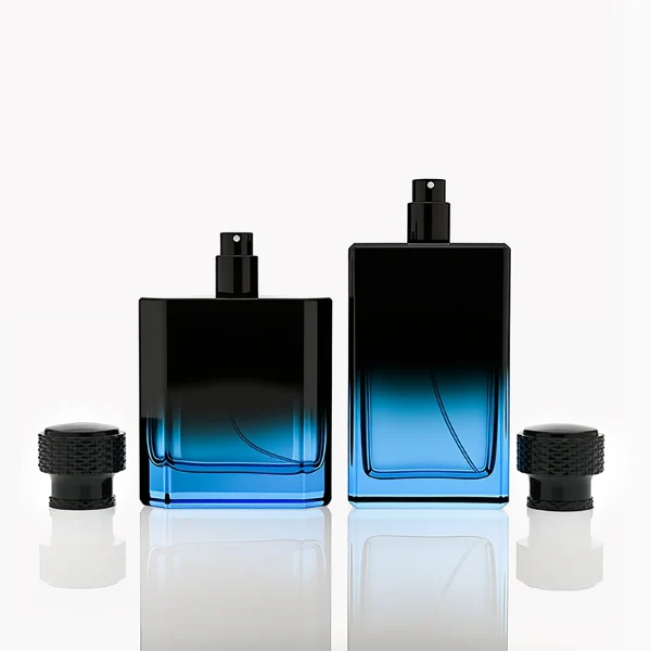 HUA0315 perfume bottle, rectangular semi-transparent glass body with blue-to-black gradient color, thick base and sharp edges, 50 ml or 100 ml liquid, textured cylindrical black plastic cap with layered neck detail, aluminum label/sticker attached on bottle surface, modern masculine luxury design, ideal for gifting and daily use.