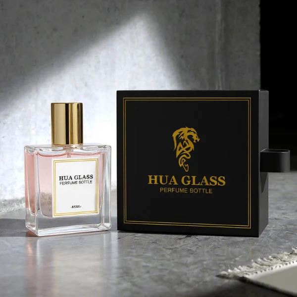 HUA0316 perfume bottle, square transparent colorless glass body with thick base and sharp edges, 30 ml, 50 ml, or 100 ml liquid, straight cylindrical Zinc Alloy cap or cylindrical cap with glossy gold bottle neck, printed label attached on bottle surface, modern minimalist luxury design, ideal for gifting and daily use.