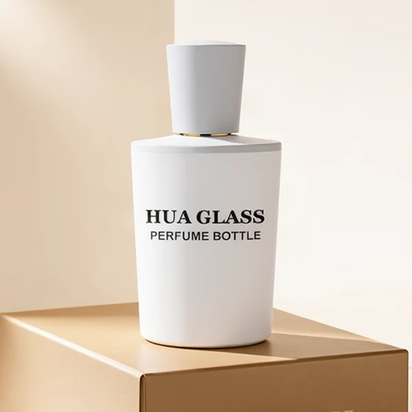 HUA0317 perfume bottle, cylindrical matte black, matte white, or transparent colorless glass body with thick rounded base, 50 ml or 70 ml liquid, flared cylindrical plastic cap in black, white, or gold finish, printed logo or brand label on bottle surface, modern minimalist fashion design, ideal for gifting and daily use.