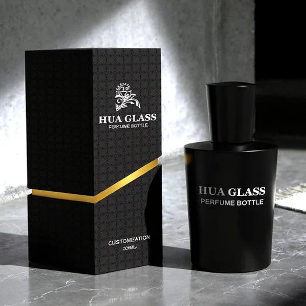 HUA0317 perfume bottle, cylindrical matte black, matte white, or transparent colorless glass body with thick rounded base, 50 ml or 70 ml liquid, flared cylindrical plastic cap in black, white, or gold finish, printed logo or brand label on bottle surface, modern minimalist fashion design, ideal for gifting and daily use.
