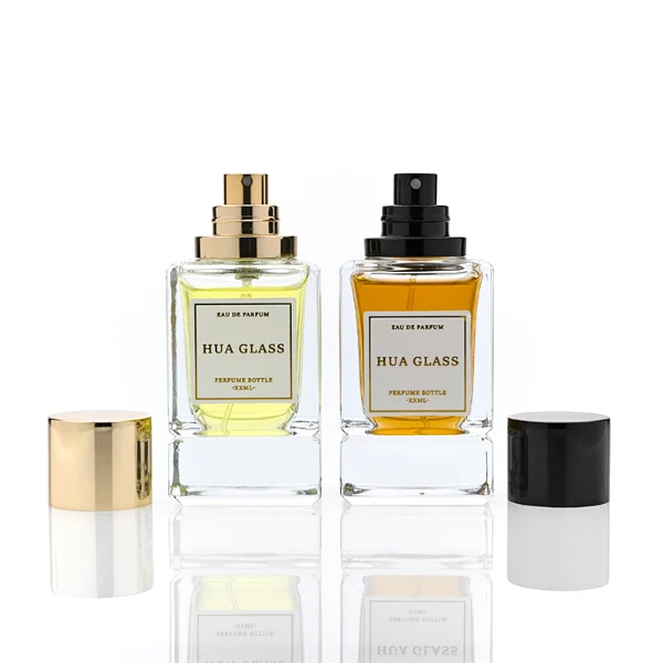 HUA0318 perfume bottle, rectangular transparent colorless glass body with thick base and sharp edges, 30 ml, 50 ml, or 100 ml liquid, glossy cylindrical aluminum cap in gold or black finish, printed label attached on bottle surface, modern minimalist luxury design, ideal for gifting and daily use.