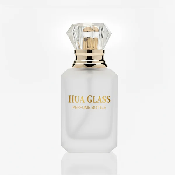 HUA0319 perfume bottle, octahedral transparent glass body with diagonal faceted cutting and thick base, 10 ml, 30 ml, 50 ml, or 100 ml liquid, diamond-shaped plastic cap with gold or silver bottle neck, aluminum label/sticker attached on bottle surface, elegant modern luxury design, ideal for gifting and daily use.