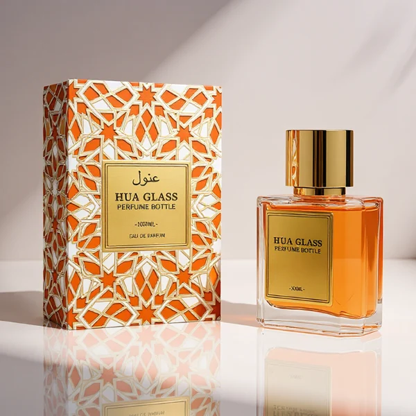 HUA0320 perfume bottle, square transparent colorless glass body with thick base and sharp edges, 50 ml or 100 ml liquid, straight cylindrical Zamac cap in glossy gold or black finish with matching bottle neck, printed label attached on bottle surface, modern minimalist luxury design, ideal for gifting and daily use.