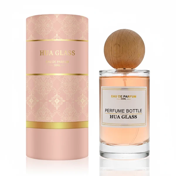 HUA0325 perfume bottle, cylindrical transparent colorless glass body with thick rounded base and smooth silhouette, 30 ml, 50 ml, 100 ml, 200 ml, or 250 ml liquid, spherical wooden cap with natural wood grain texture in light or dark finish, printed label attached on bottle surface, natural modern minimalist design, ideal for gifting and display.