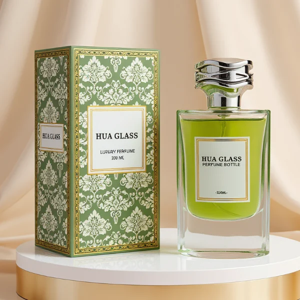 HUA0327 perfume bottle, minimalist geometric cylindrical transparent glass body with smooth curved sides and thick base, 80 ml liquid, irregular geometric plastic cap with side wave-texture in glossy gold or silver finish, printed label on bottle surface, modern minimalist luxury design, ideal for gifting and daily use.
